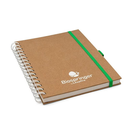eco-friendly notebook made of brown kraft paper bound with a white spiral